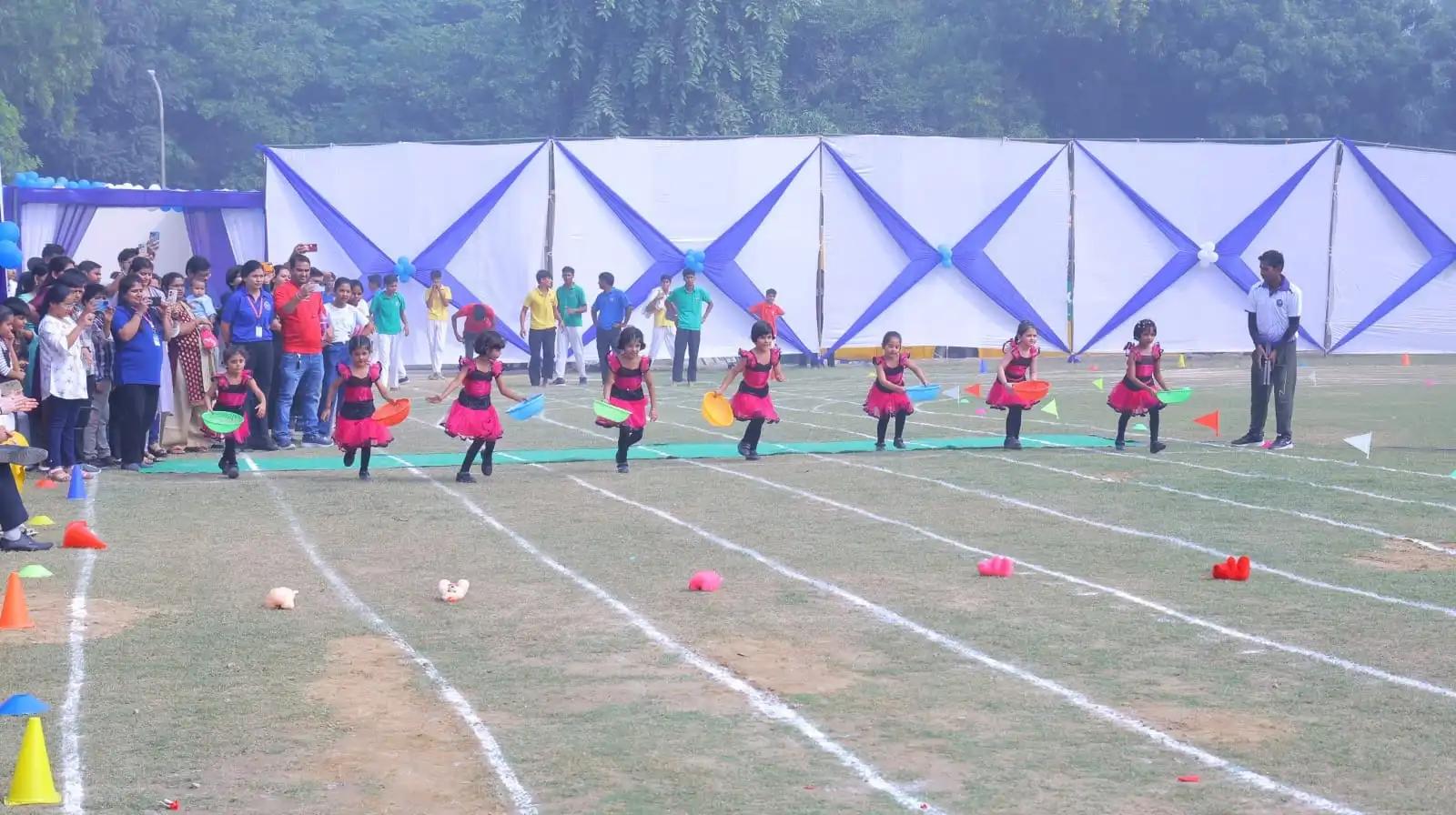 Students participating in athletics on sports day