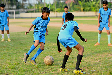 Students playing football